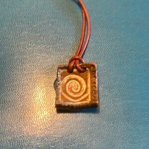 Pottery and leather hand made necklace one of a kind designs